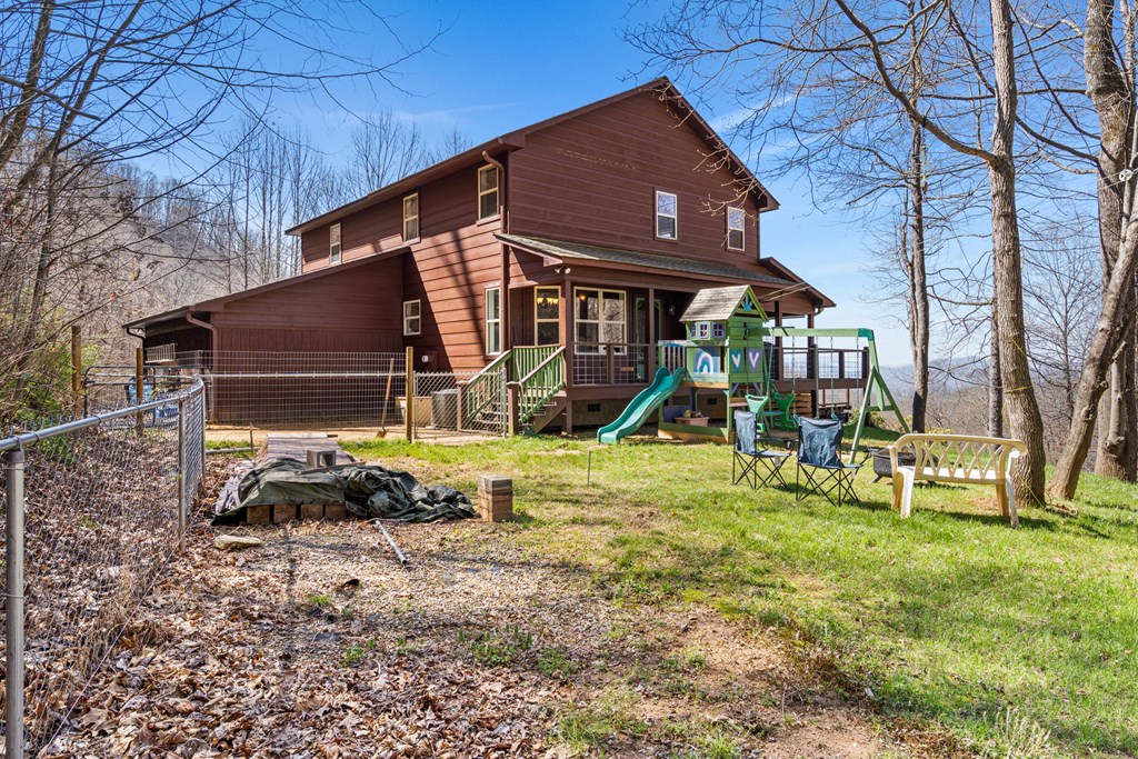 961 South Brooks Cove Road Hayesville, NC 28904 - Photo 40 of 55 a view of a house with backyard