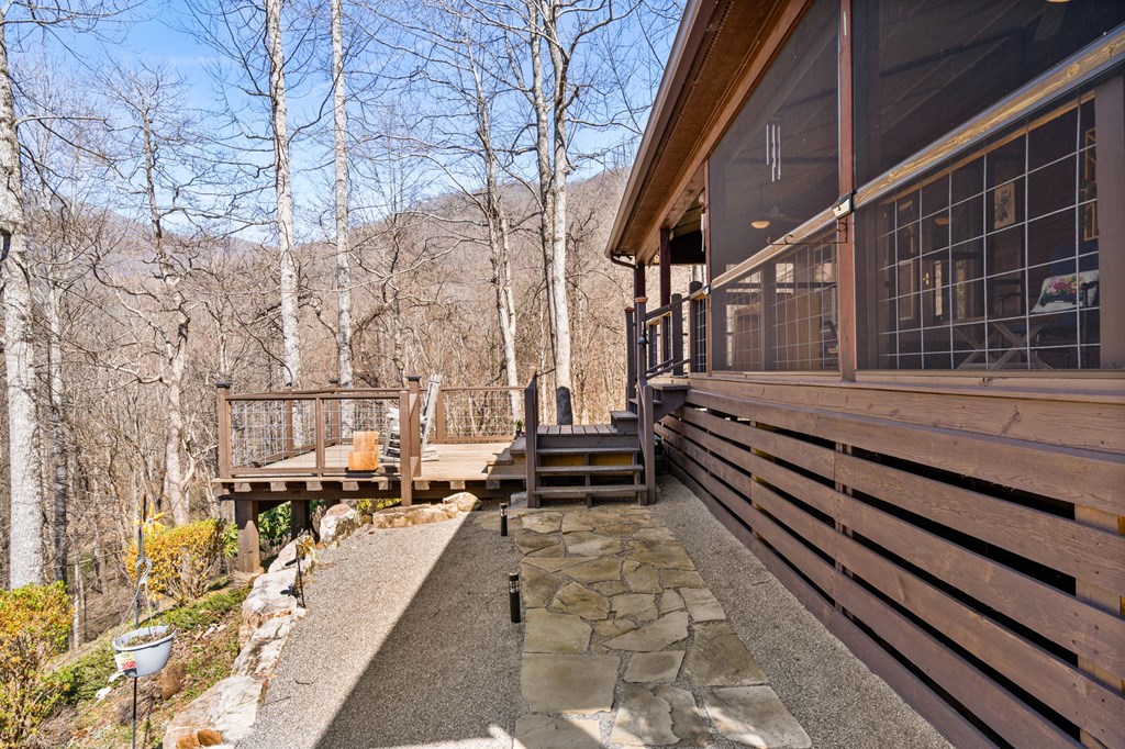 961 South Brooks Cove Road Hayesville, NC 28904 - Photo 43 of 55 a view of a building with a bench