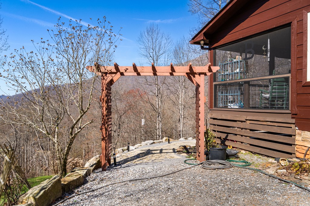 961 South Brooks Cove Road Hayesville, NC 28904 - Photo 44 of 55 a view of a house with a snow on the road