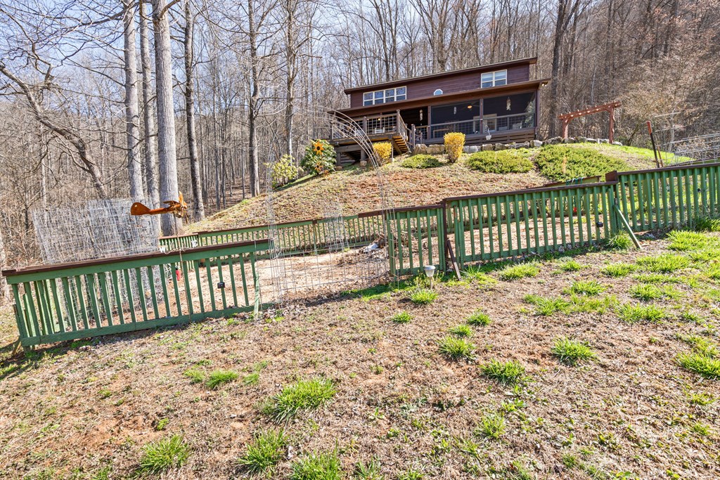 961 South Brooks Cove Road Hayesville, NC 28904 - Photo 49 of 55 a front view of a house with a yard