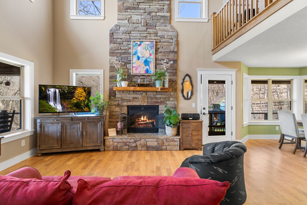 961 South Brooks Cove Road Hayesville, NC 28904 - Photo 5 of 55 a living room with furniture and a fireplace
