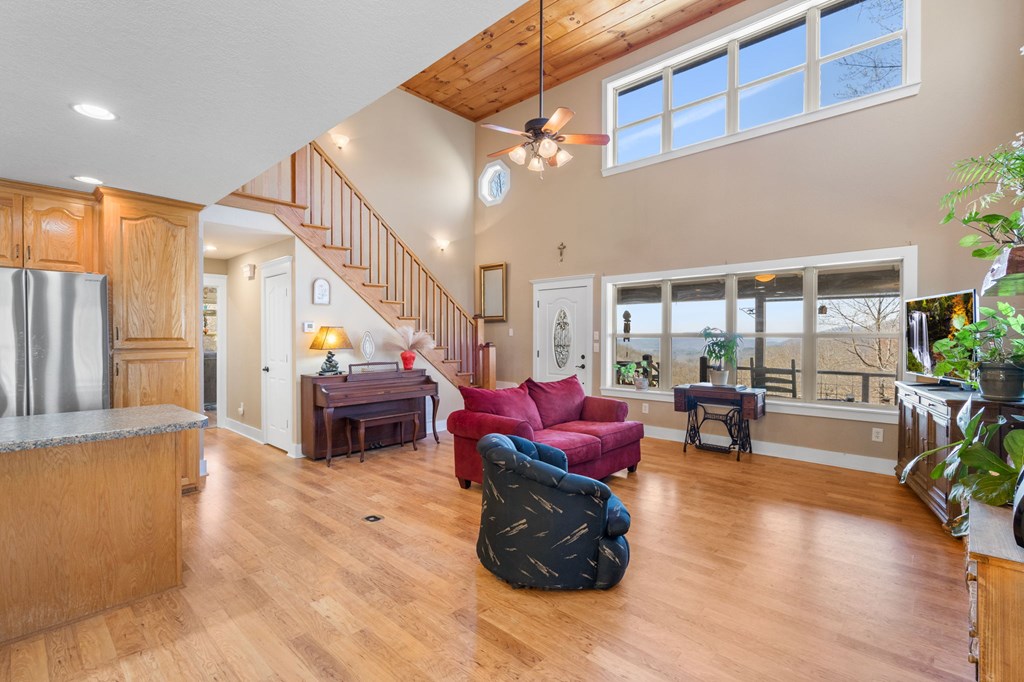 961 South Brooks Cove Road Hayesville, NC 28904 - Photo 7 of 55 a living room with furniture and a potted plant