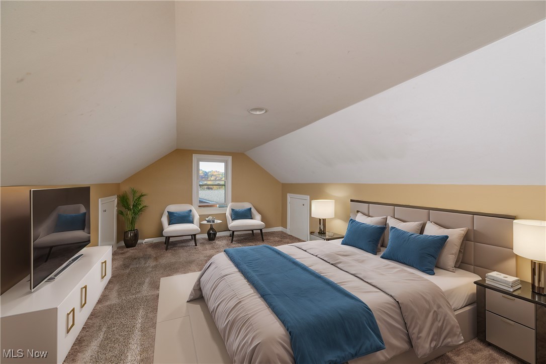 1320 Perry Drive Northwest Canton, OH 44708 - Photo 24 of 34 Bedroom featuring vaulted ceiling and dark colored carpet