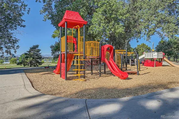 a view of a park with a slide