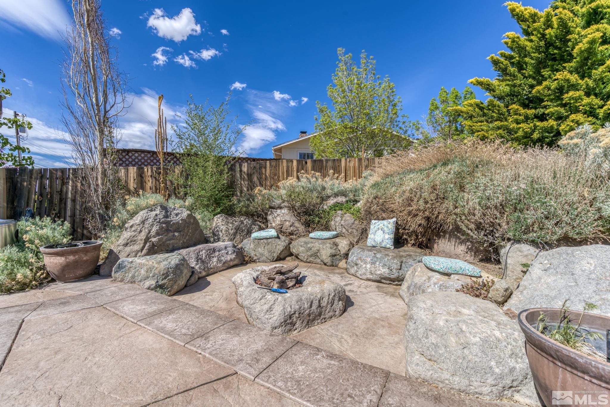 14615 Virginia Foothills Drive Reno, NV 89521 - Photo 24 of 27 a view of a backyard with sitting area