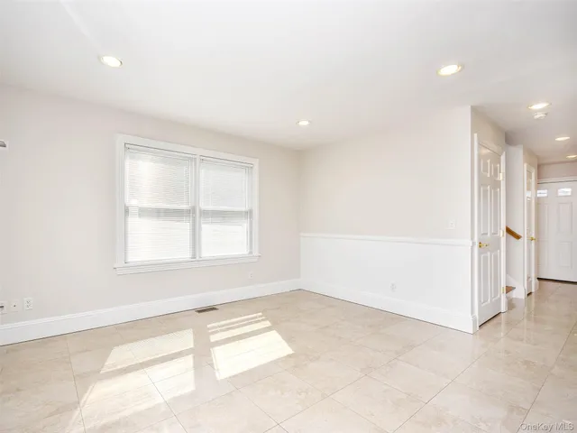 an empty room with a natural light