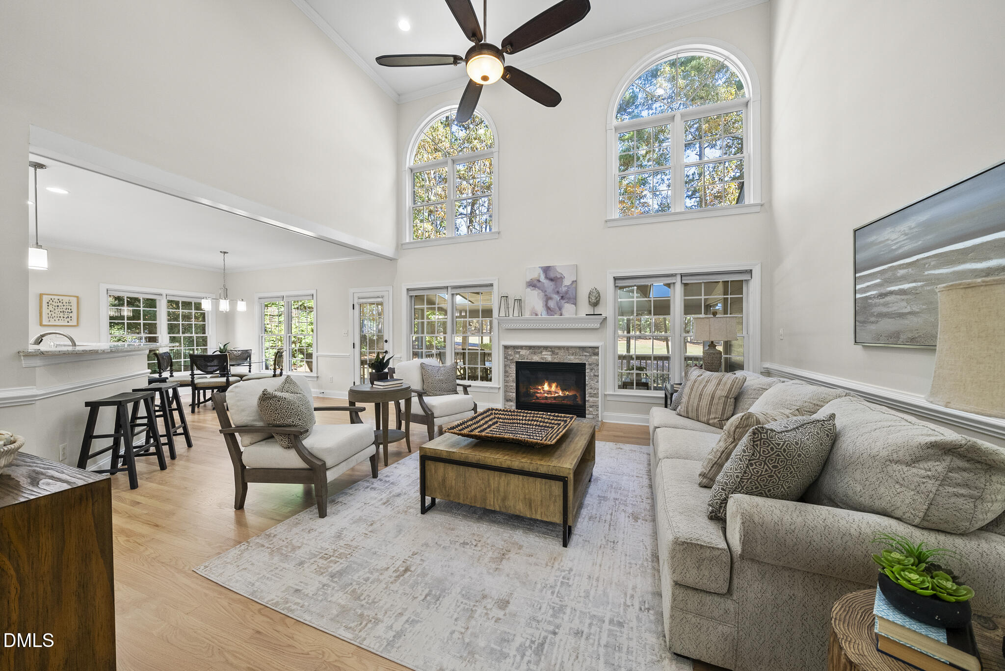 305 Ridge Creek Drive Morrisville, NC 27560 - Photo 14 of 43 a living room with furniture and a fireplace