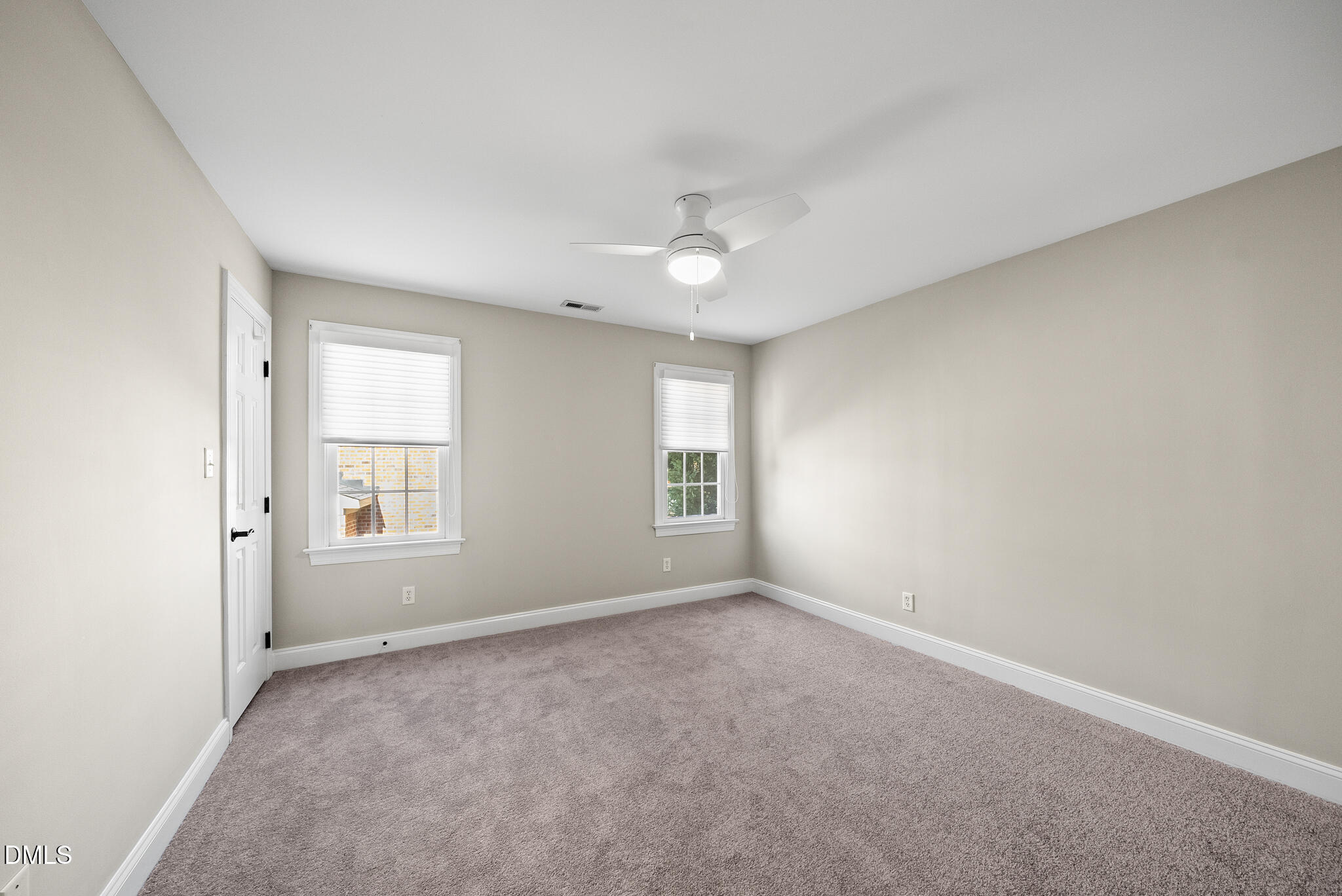 305 Ridge Creek Drive Morrisville, NC 27560 - Photo 25 of 43 an empty room with a window and a ceiling fan