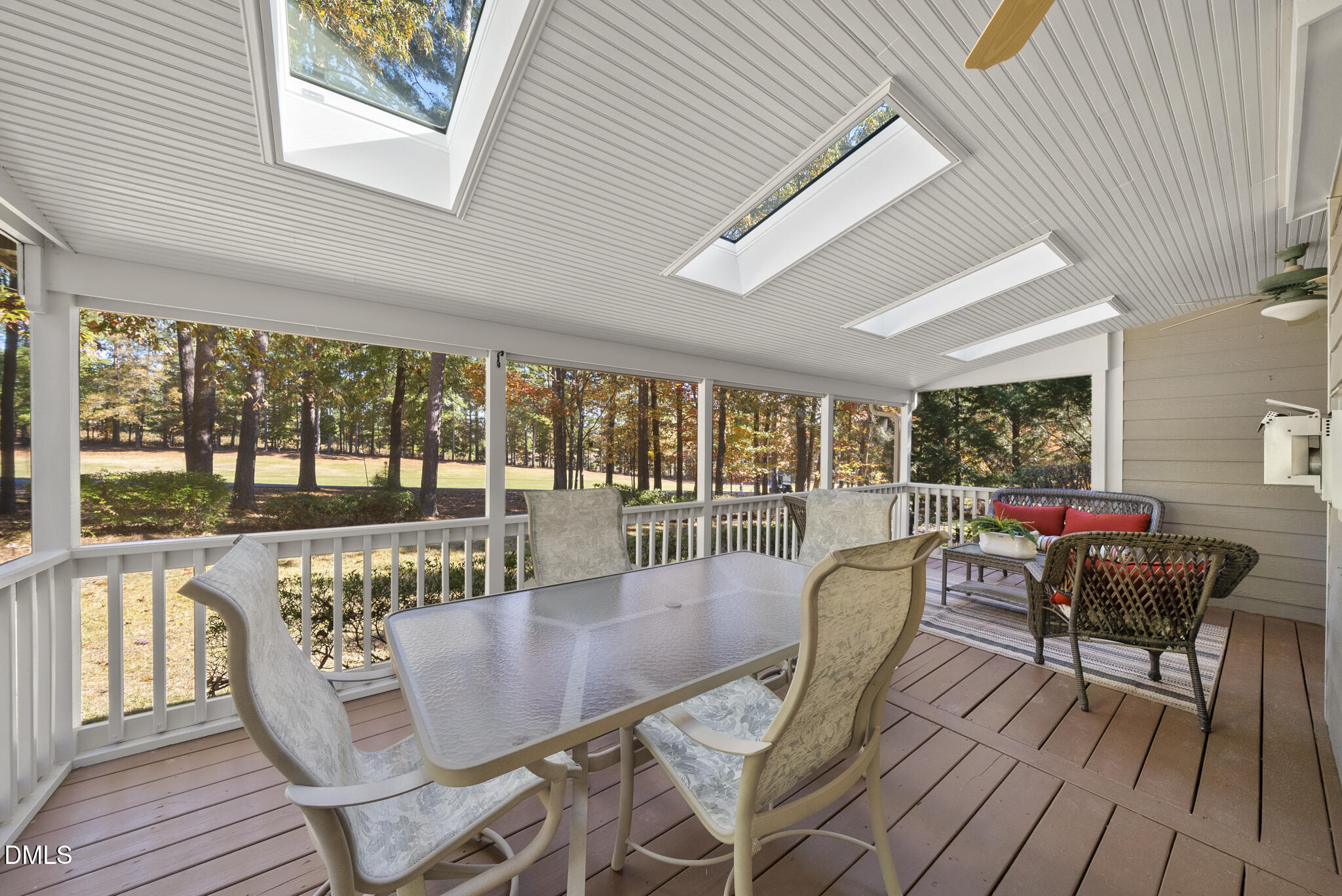 305 Ridge Creek Drive Morrisville, NC 27560 - Photo 32 of 43 a dining room with furniture wooden floor and garden view