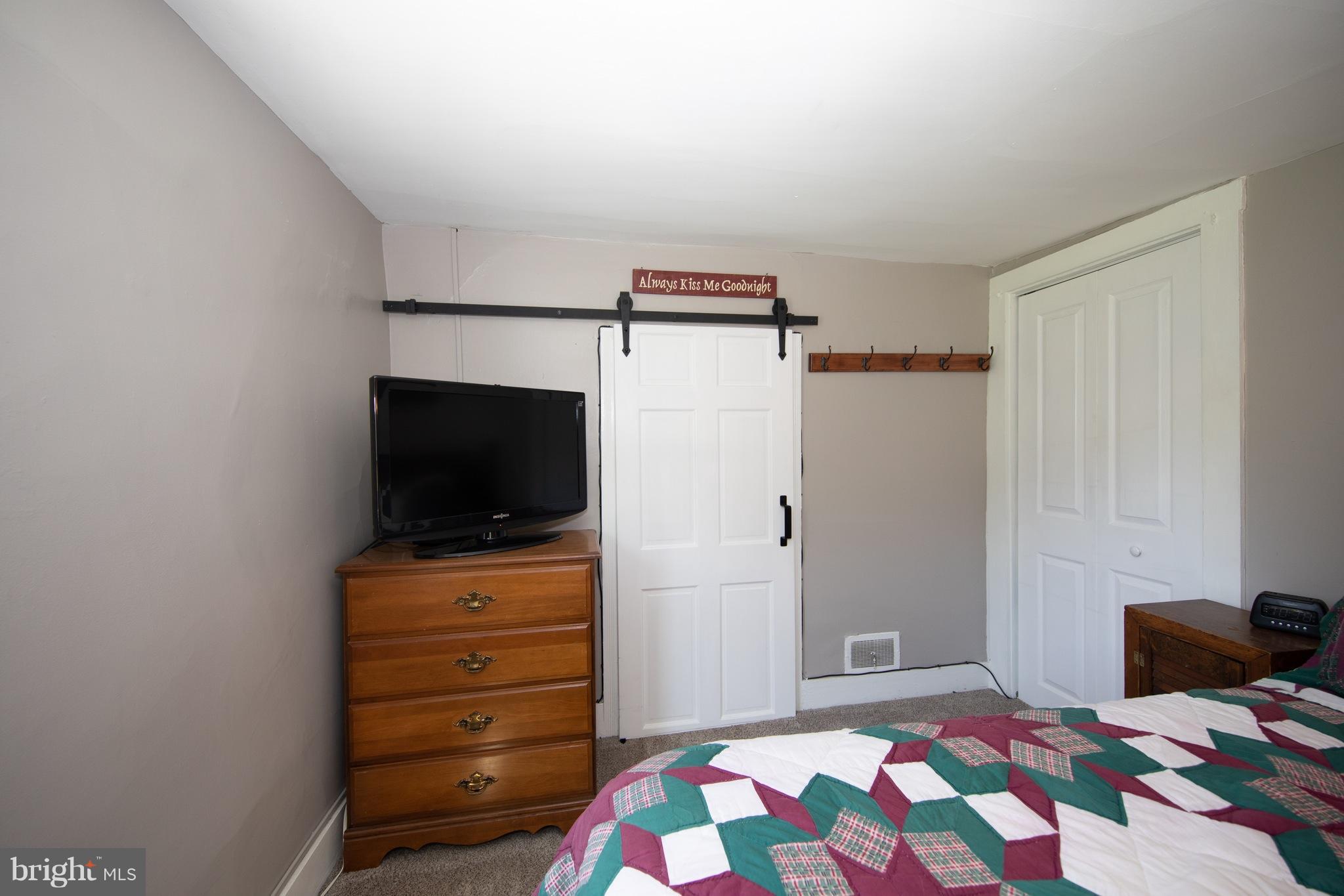 542 Harrisville Road Colora, MD 21917 - Photo 16 of 30 Barn door in master bedroom