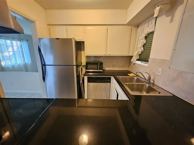 a view of an empty room with window