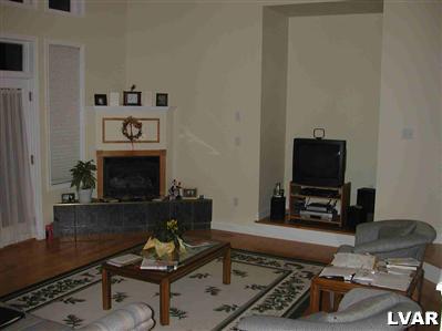 5892 Alexander Road Bethlehem, PA 18017 - Photo 6 of 11 great room w/gas fireplace, opens to deck, hardwood floors