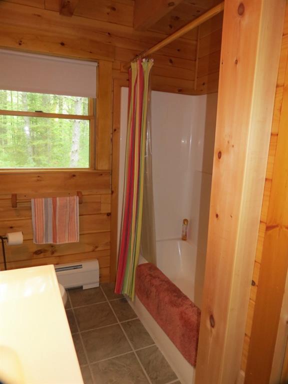 90 Big Woods Road Harrison, ME 04040 - Photo 22 of 34 First floor bath showing full tub