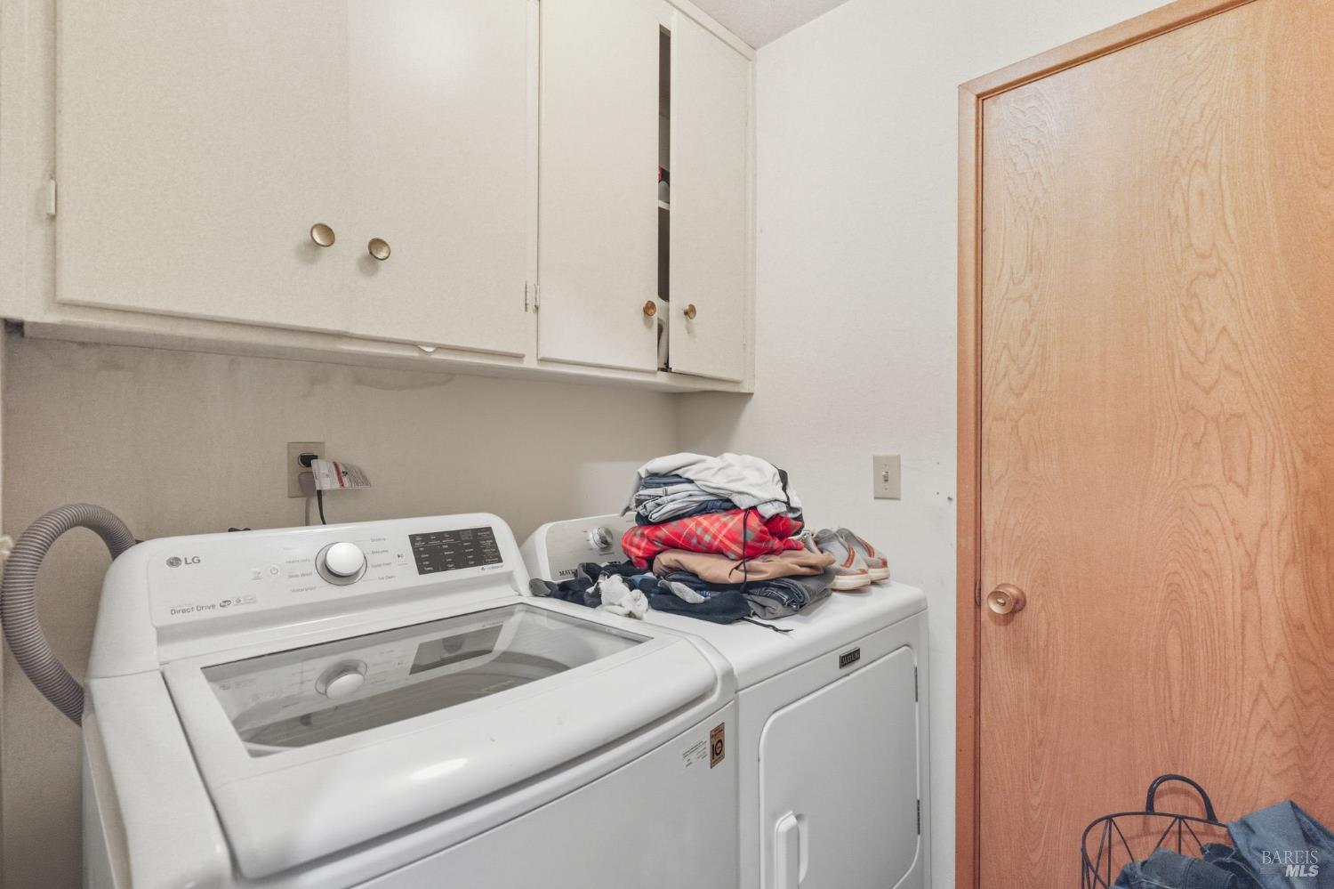1 Green Point Lane Novato, CA 94945 - Photo 20 of 33 Indoor / Upstairs laundry room with door to garage