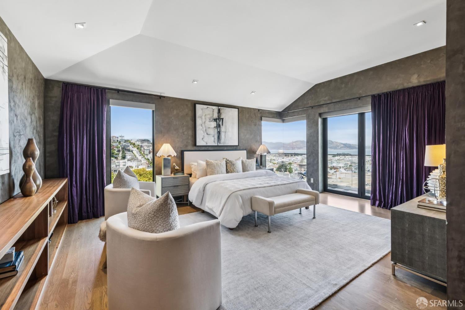 2755 Fillmore Street San Francisco, CA 94123 - Photo 41 of 99 a bedroom with a bed and large windows