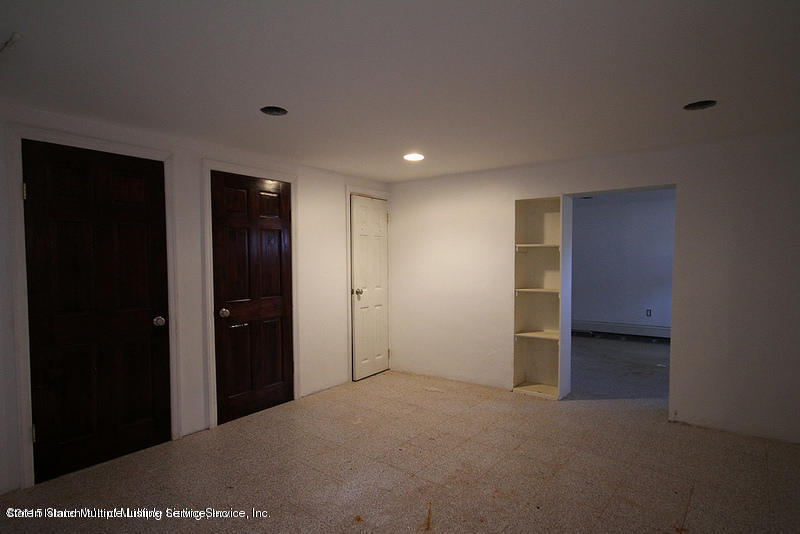 102-104 Robin Road Staten Island, NY 10305 - Photo 21 of 23 Basement living room