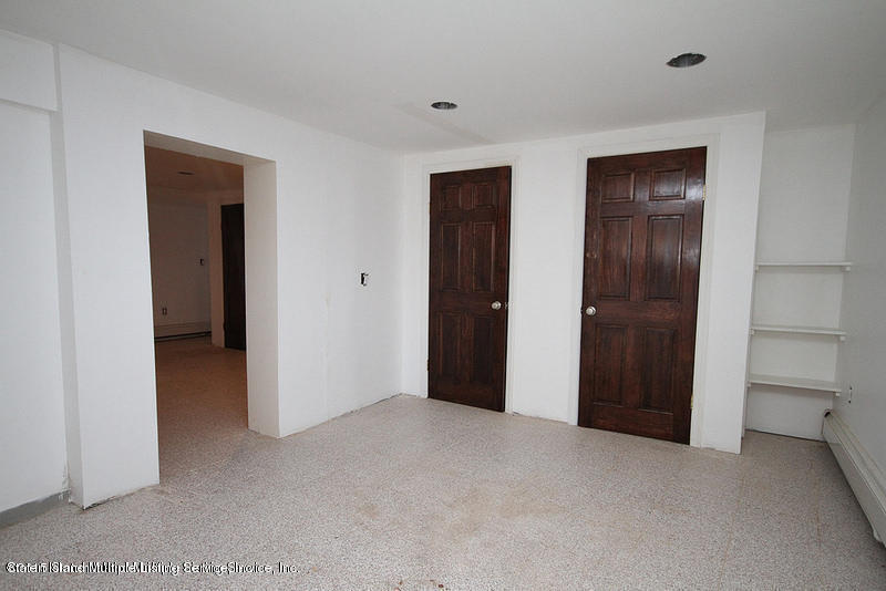 102-104 Robin Road Staten Island, NY 10305 - Photo 23 of 23 Basement bed