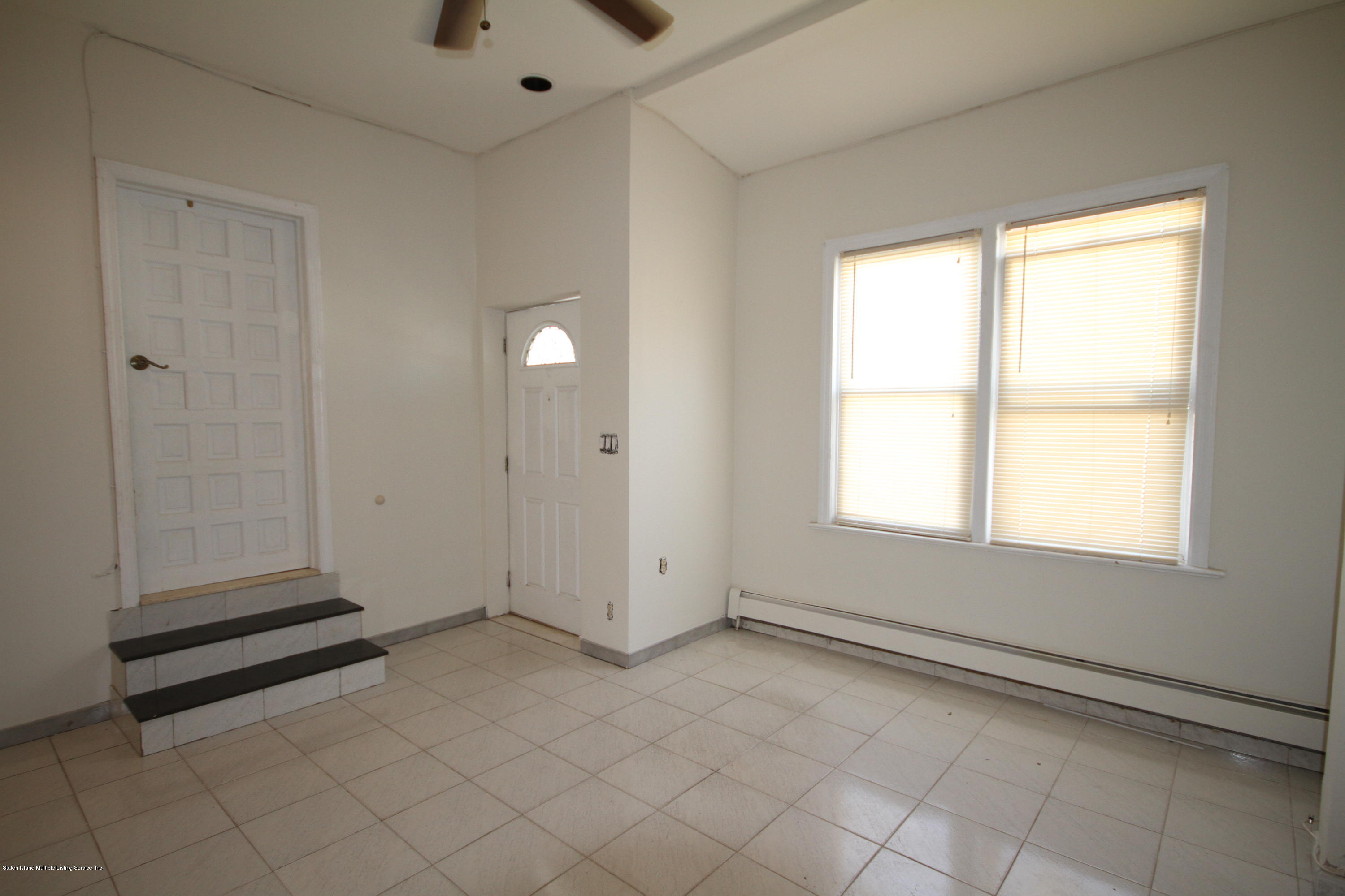 102-104 Robin Road Staten Island, NY 10305 - Photo 3 of 23 Living room angle 2