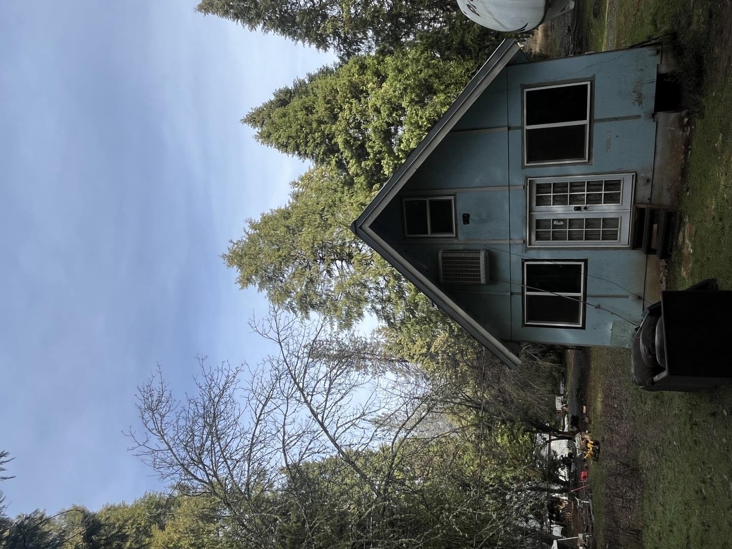 a backyard of a house with lots of green space