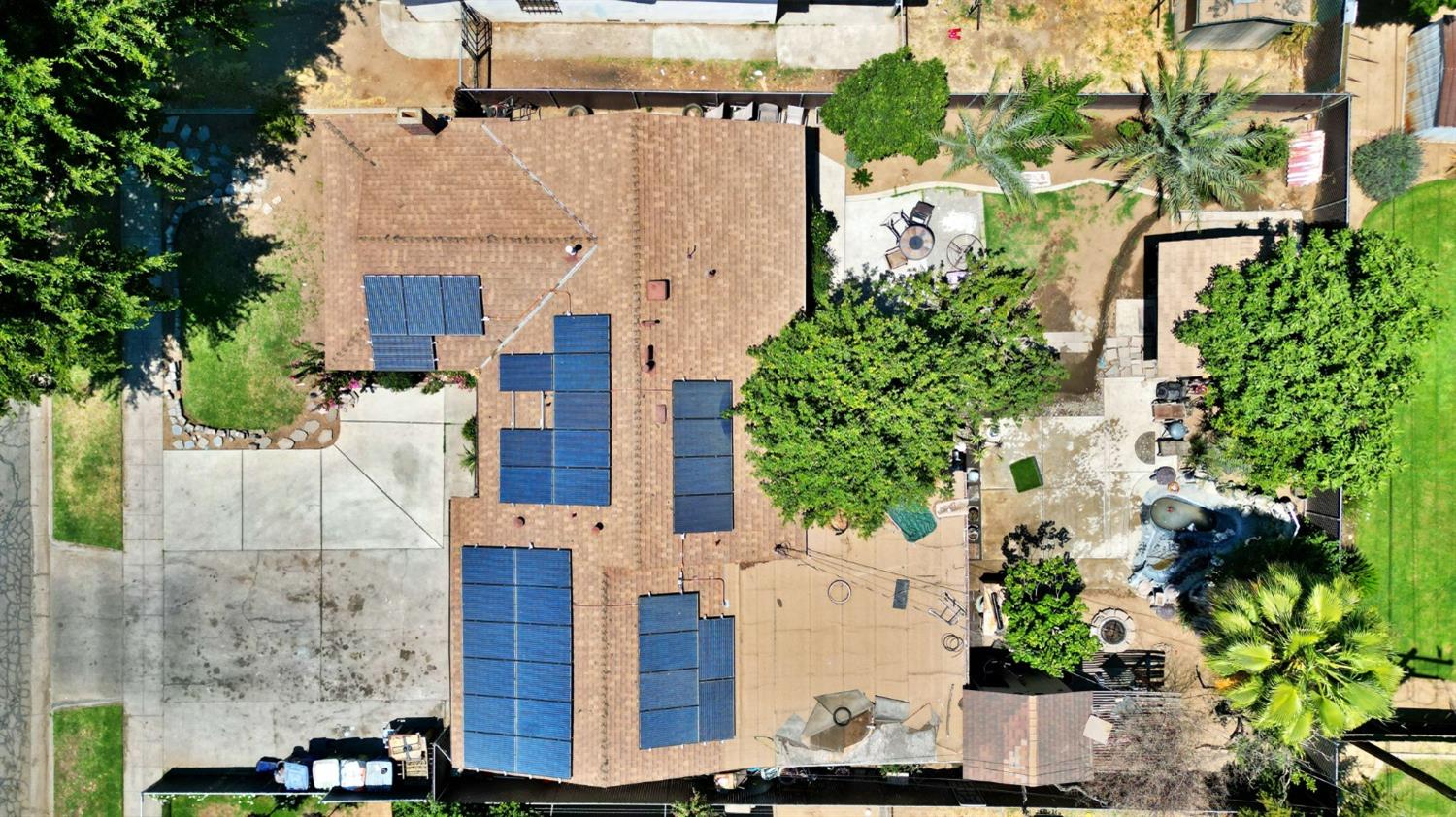 1735 South Maple Avenue Fresno, CA 93702 - Photo 21 of 24 an aerial view of residential houses with outdoor space