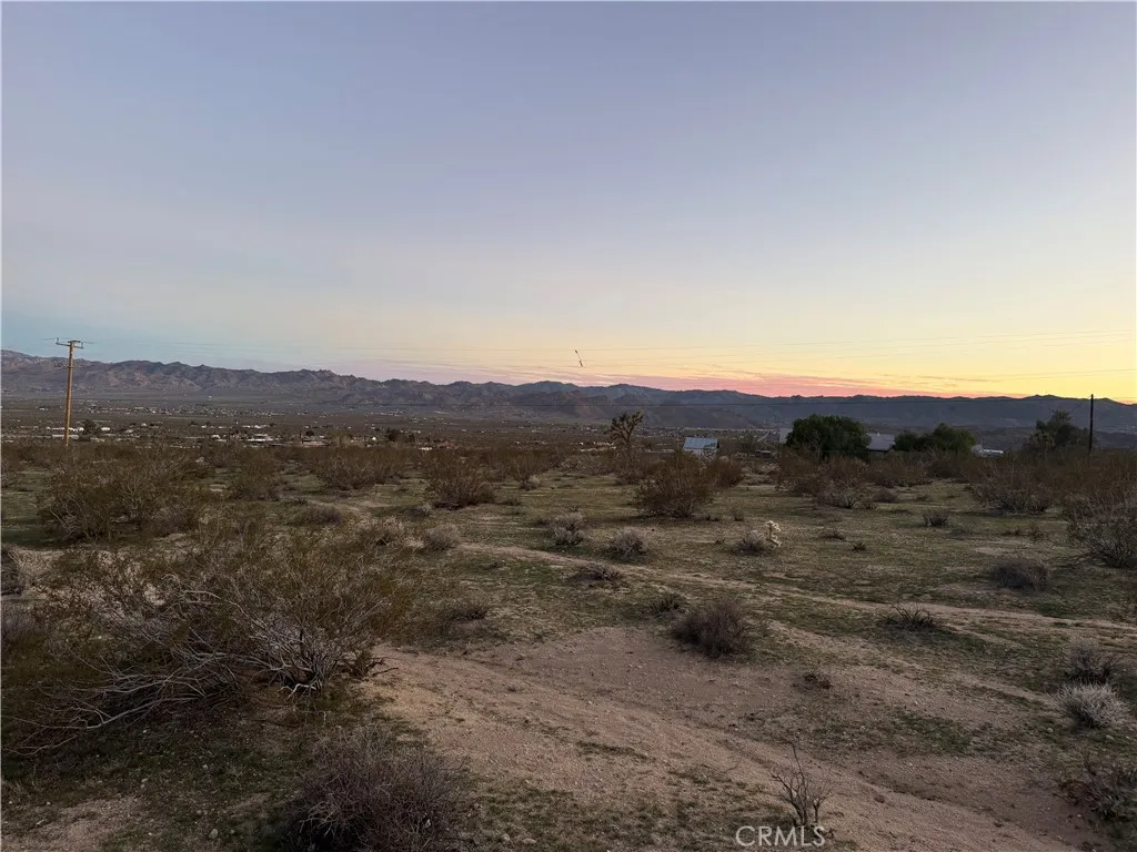 0 Campanula Street Joshua Tree, CA 92252 - Photo 12 of 20 a view of a large mountain with mountains in the background