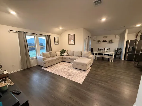 a view of dining table and chairs