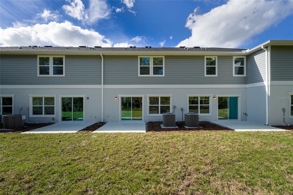 16607 Luminary Loop Clermont, FL 34714 - Photo 18 of 18 a house view with a garden space