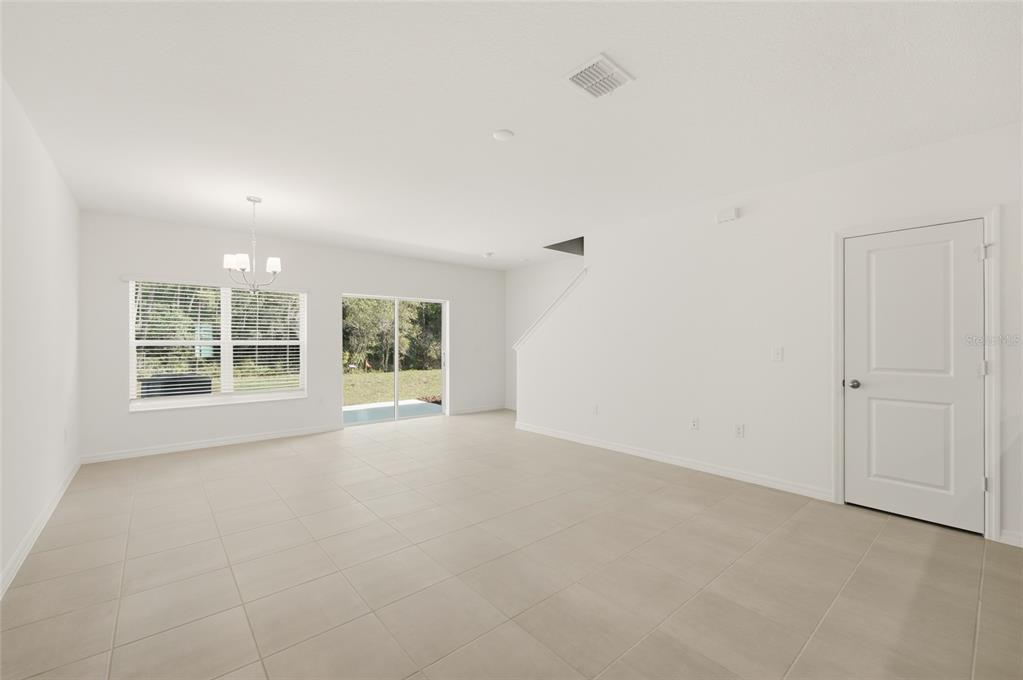 16607 Luminary Loop Clermont, FL 34714 - Photo 5 of 18 an empty room with windows