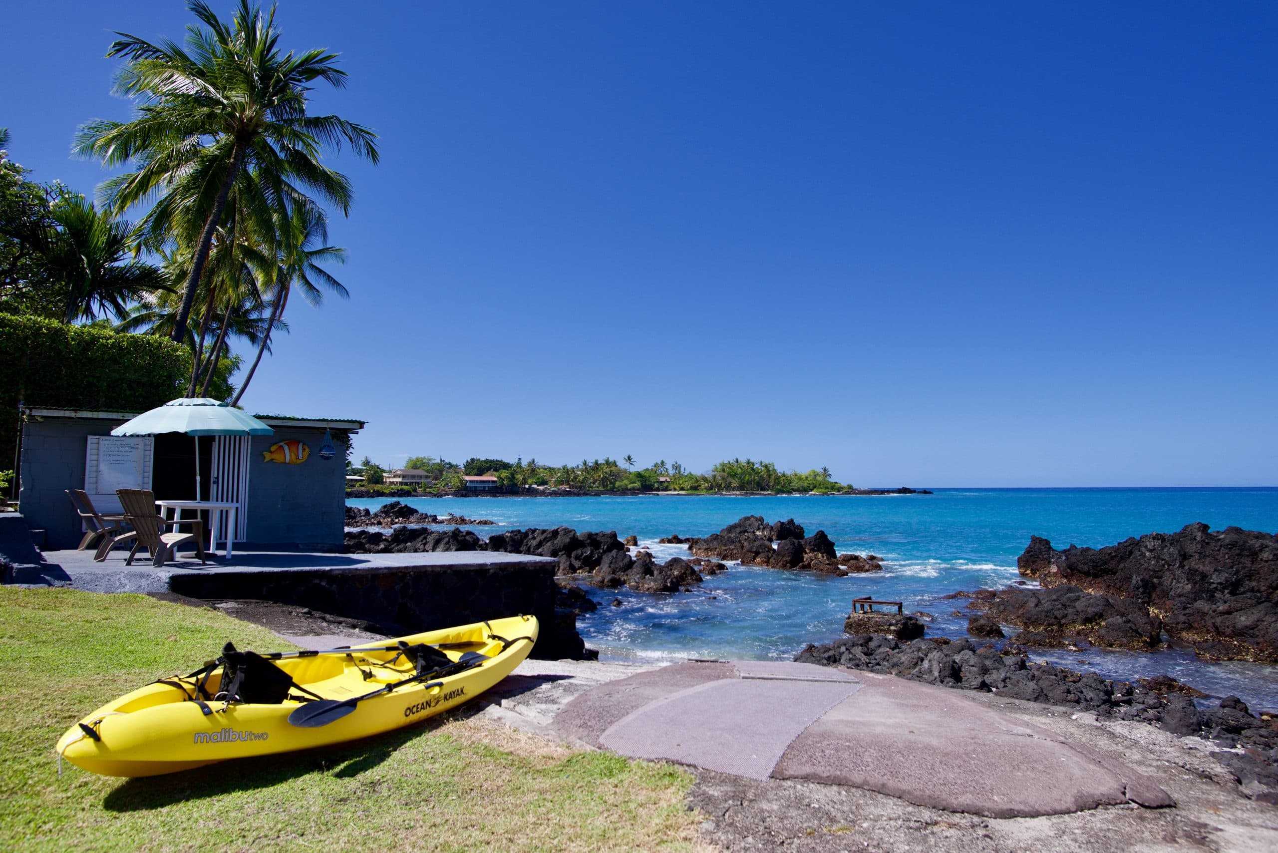 82-6047 Puuhonua Road Captain Cook, HI 96704 - Photo 6 of 25 a small pool with lawn chairs
