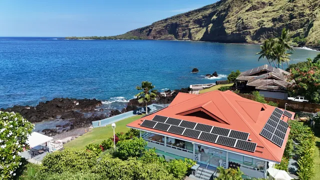 an aerial view of a house with a garden
