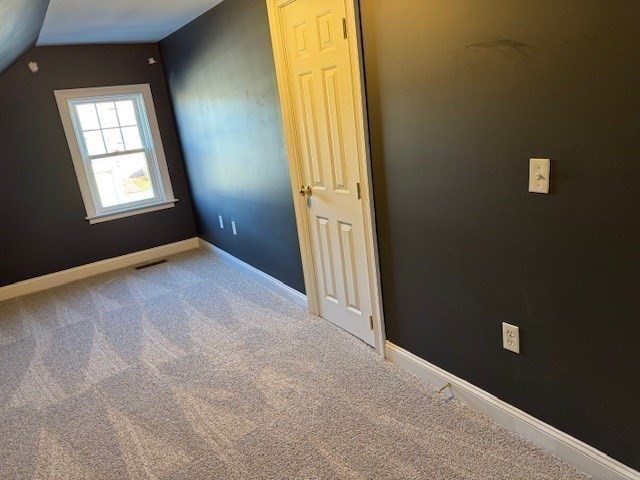 4 Wilson Street, Unit LEFT Billerica, MA 01862 - Photo 24 of 29 an empty room with windows