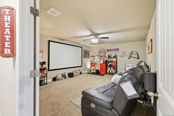 a room with furniture and a flat screen tv