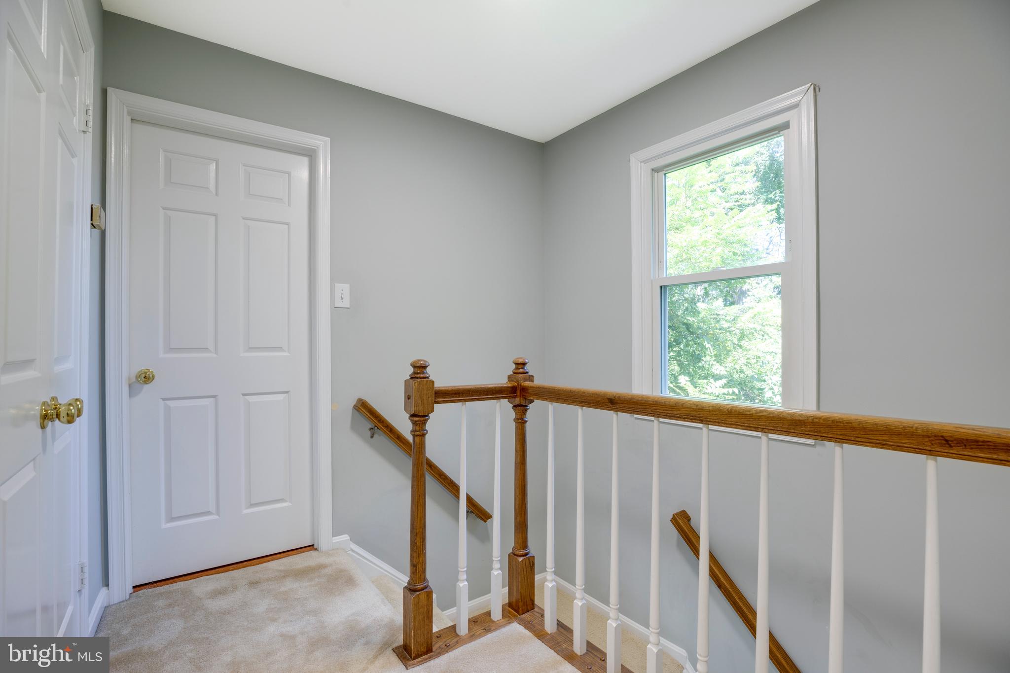 160 Washington Street Occoquan, VA 22125 - Photo 15 of 30 a view of a hallway with windows