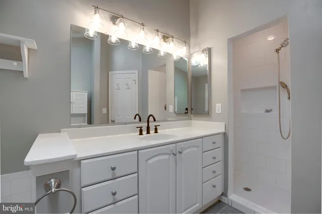 a view of an empty room with a fireplace