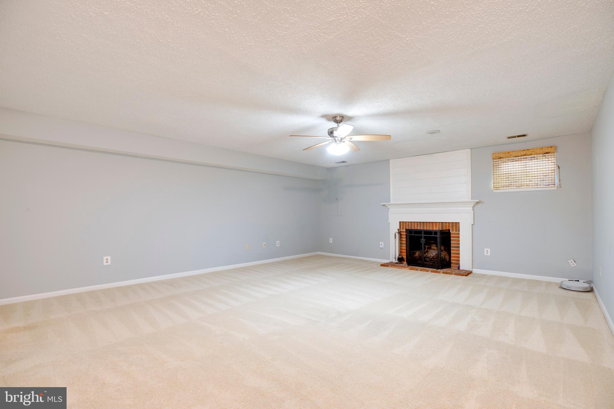 160 Washington Street Occoquan, VA 22125 - Photo 25 of 30 a view of an empty room with a fireplace
