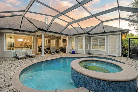 a view of a house with swimming pool