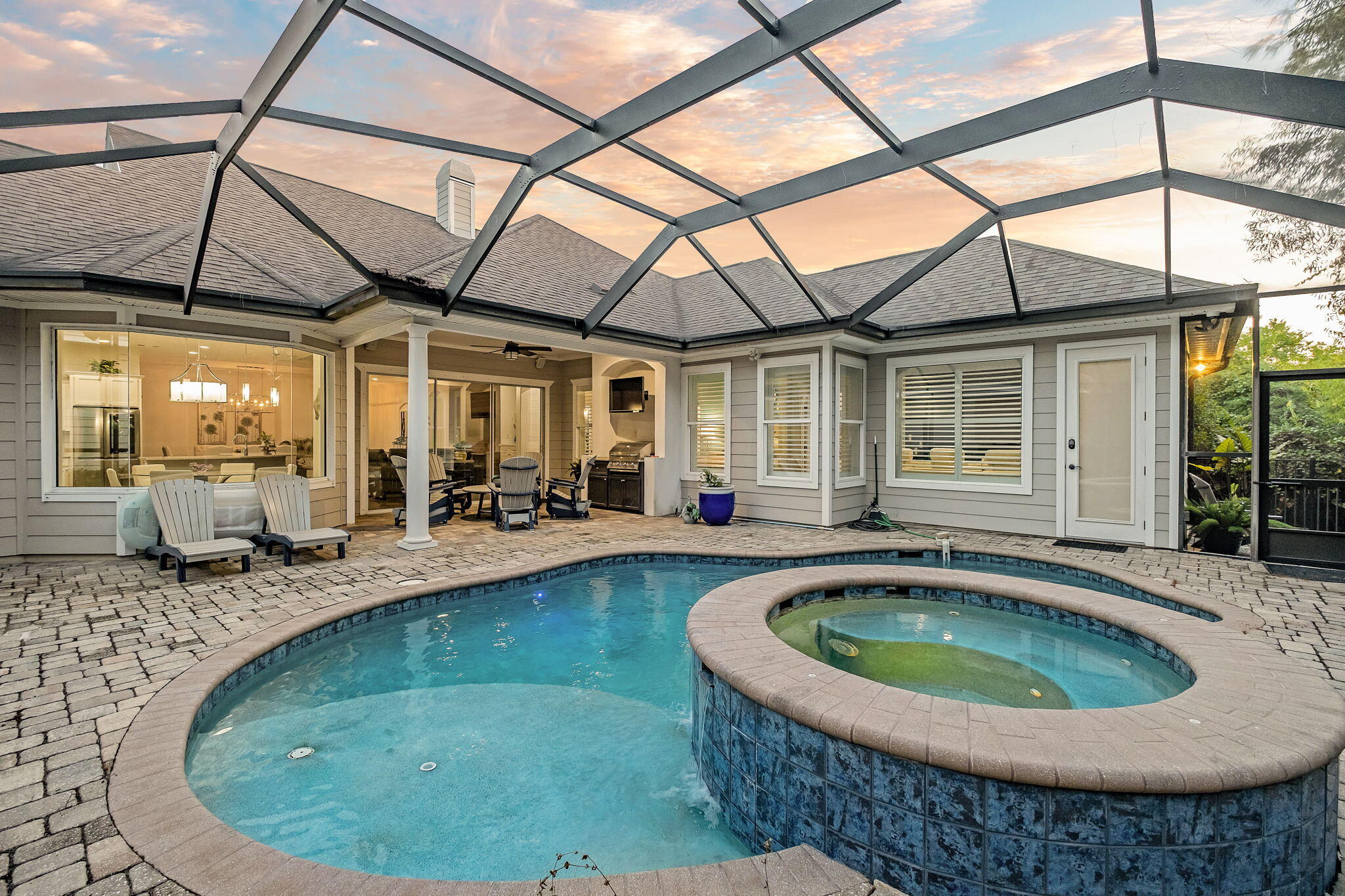 a view of a house with swimming pool
