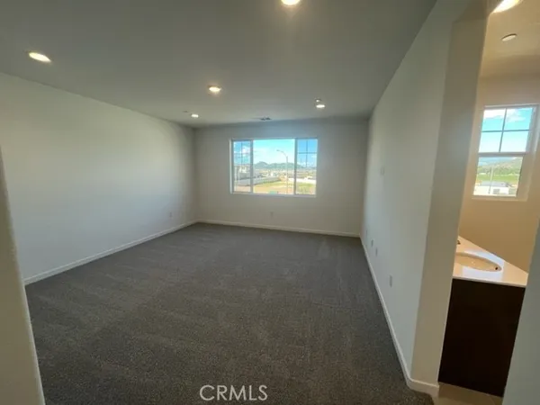 an empty room with windows