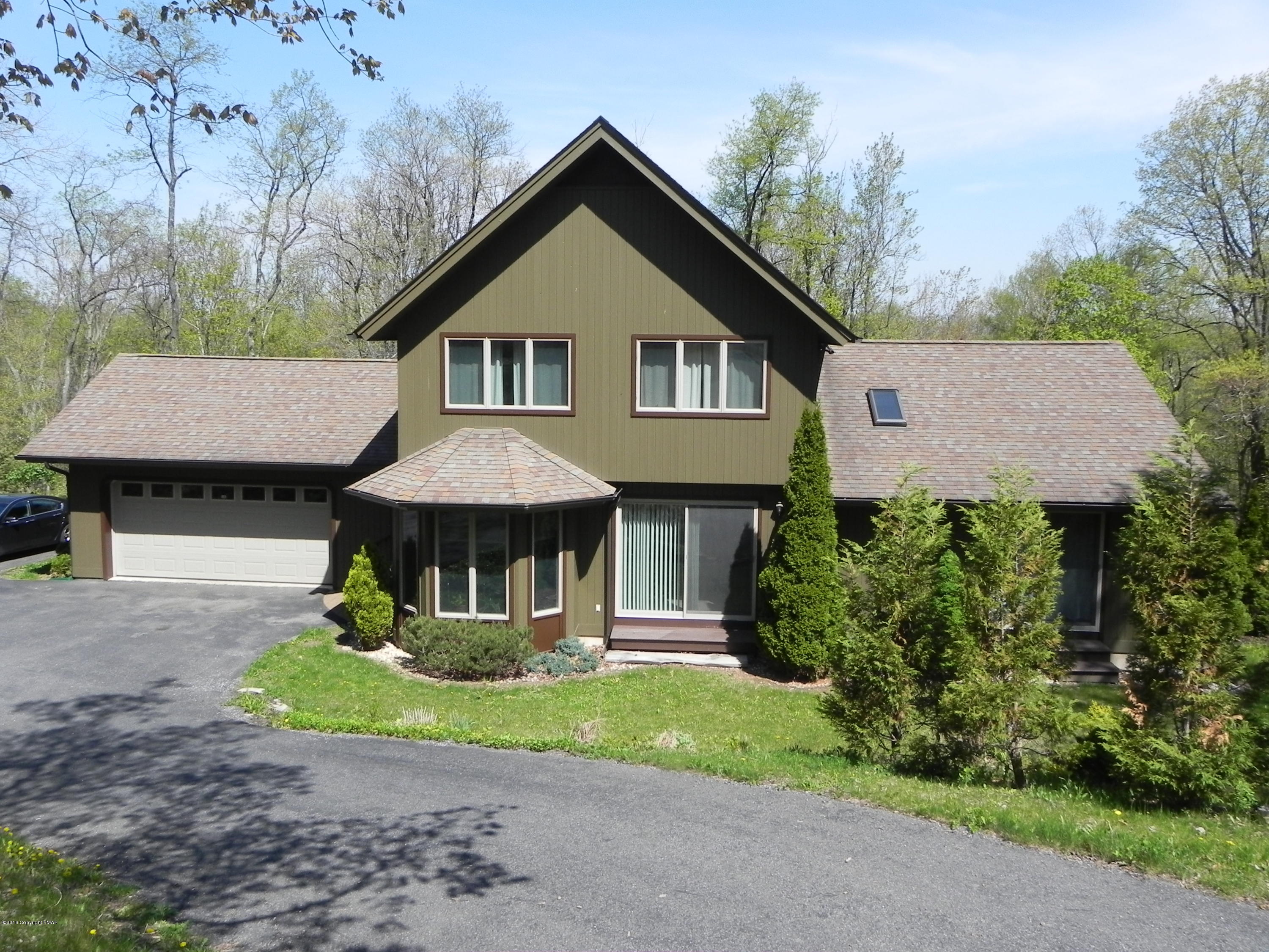 2342 Point Phillips Road Kunkletown, PA 18058 - Photo 1 of 28 a front view of a house with garden
