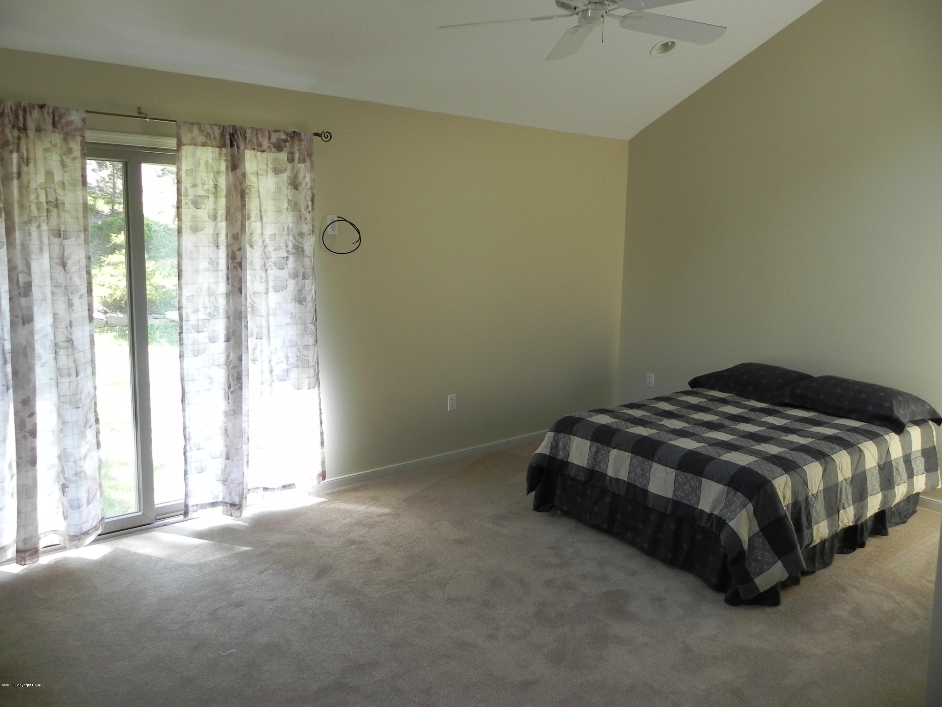 2342 Point Phillips Road Kunkletown, PA 18058 - Photo 12 of 28 a bedroom with a bed and window