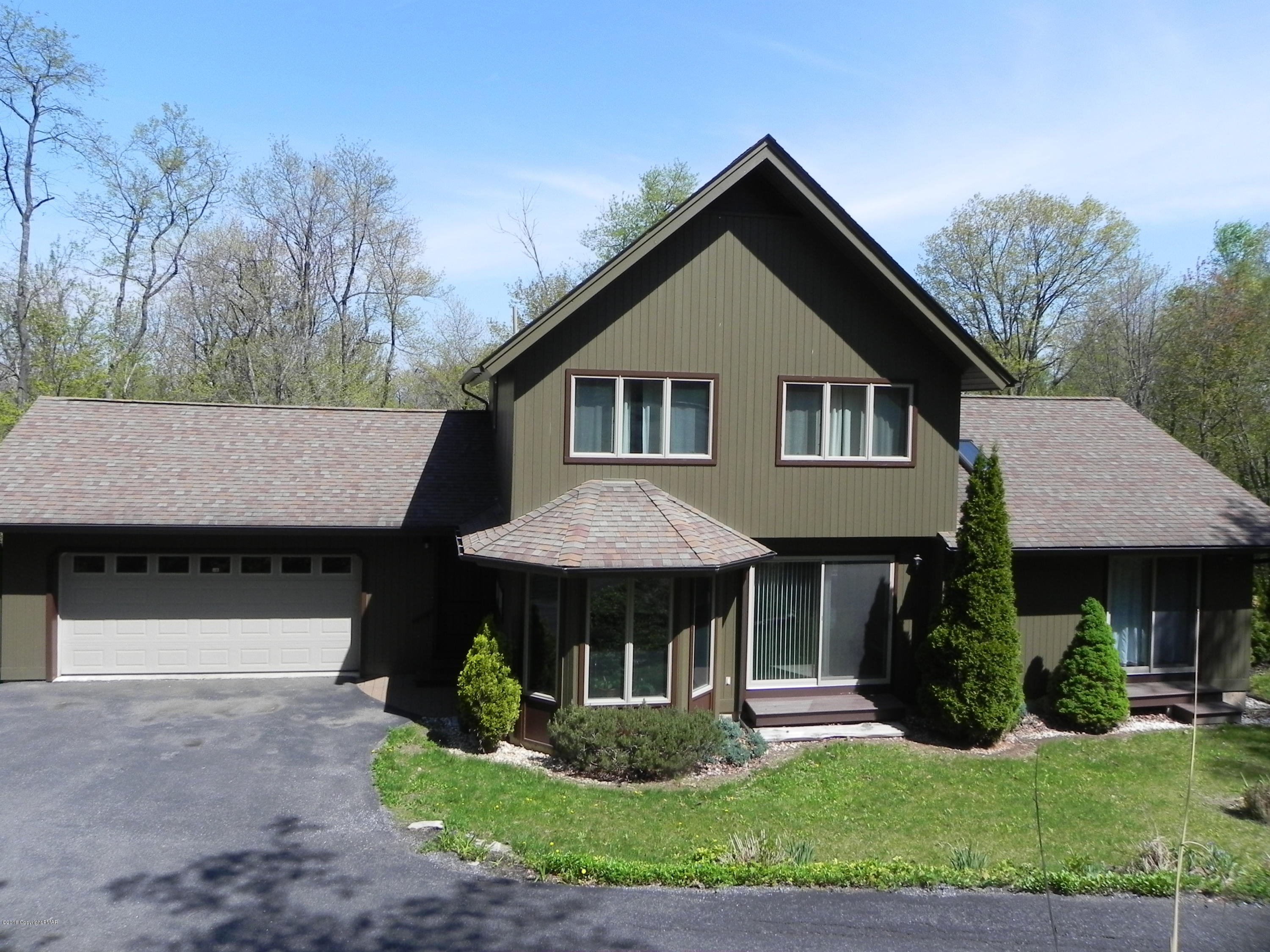 2342 Point Phillips Road Kunkletown, PA 18058 - Photo 2 of 28 a front view of a house with a yard and garage