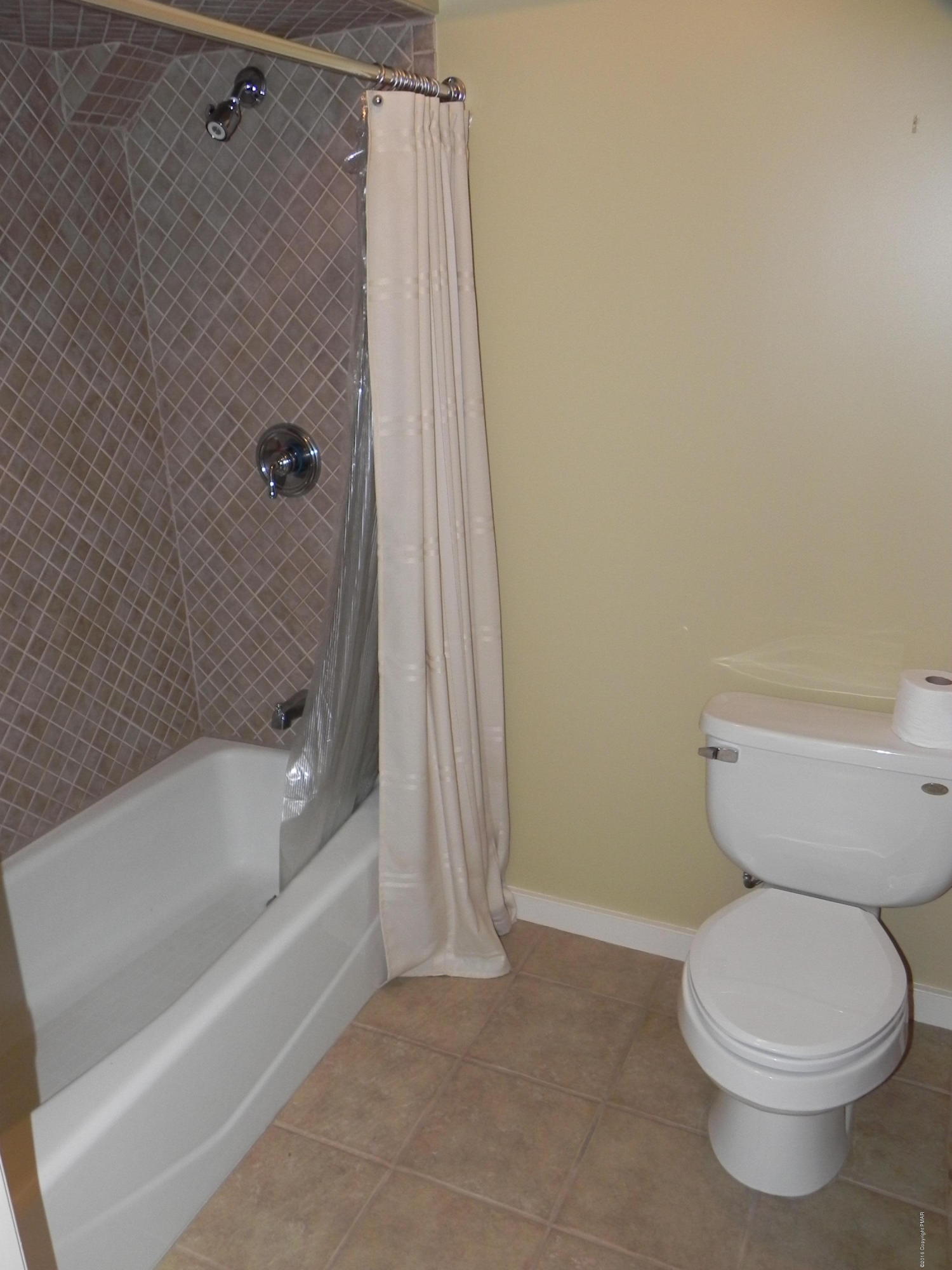 2342 Point Phillips Road Kunkletown, PA 18058 - Photo 23 of 28 a bathroom with a toilet and a bathtub