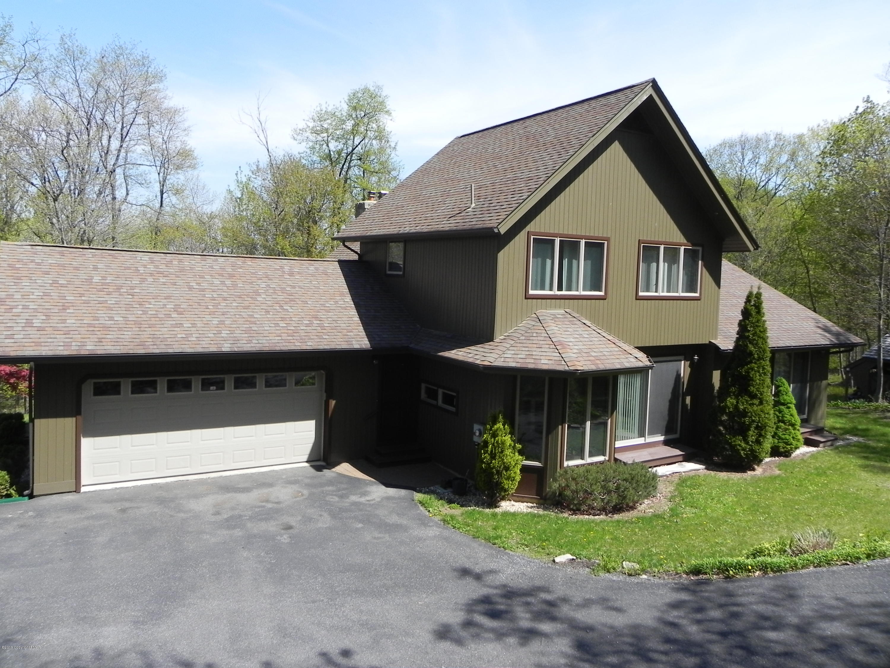 2342 Point Phillips Road Kunkletown, PA 18058 - Photo 3 of 28 a front view of a house with a yard and trees