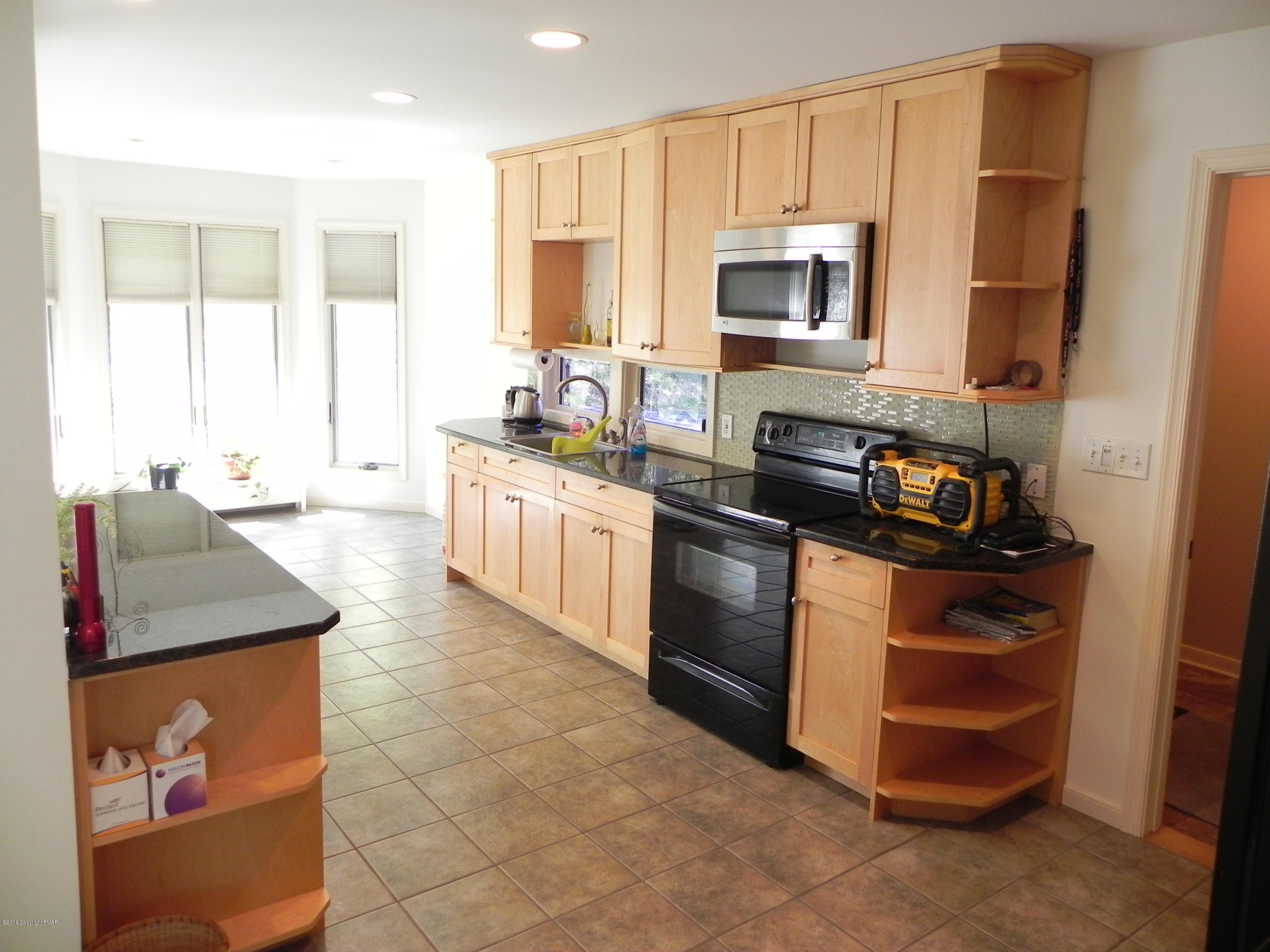 2342 Point Phillips Road Kunkletown, PA 18058 - Photo 6 of 28 a kitchen with a sink stove and microwave