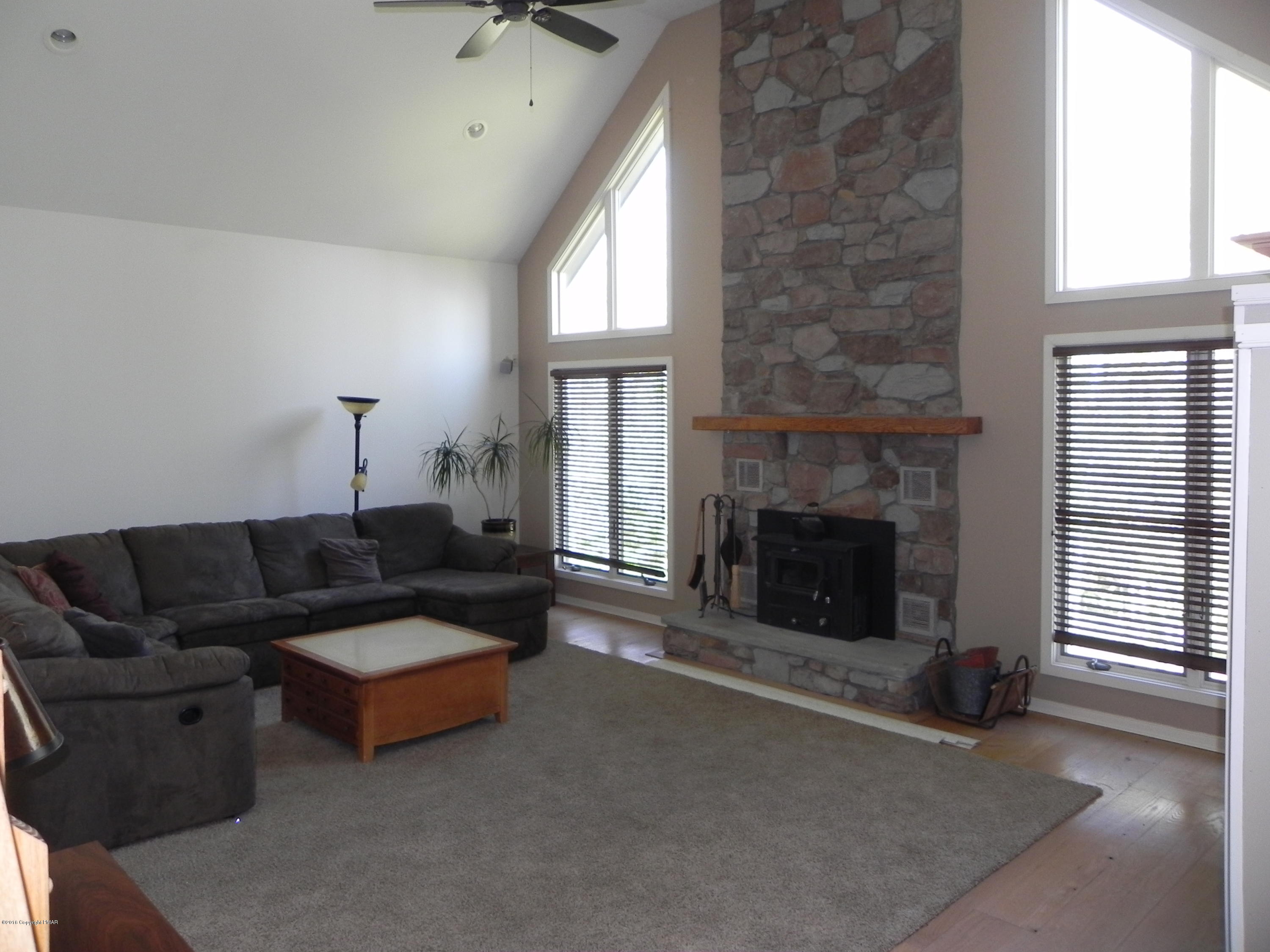 2342 Point Phillips Road Kunkletown, PA 18058 - Photo 9 of 28 a living room with furniture and a fireplace