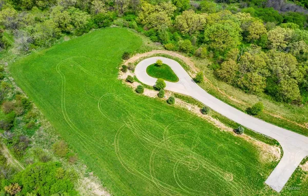 a view of a golf course with a lake