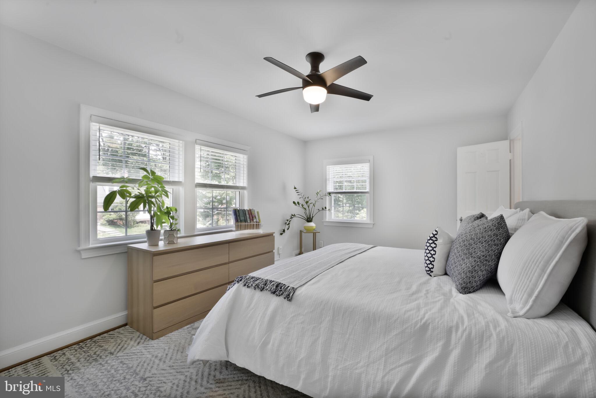 1512 Live Oak Drive Silver Spring, MD 20910 - Photo 19 of 34 a bedroom with a large bed and a window