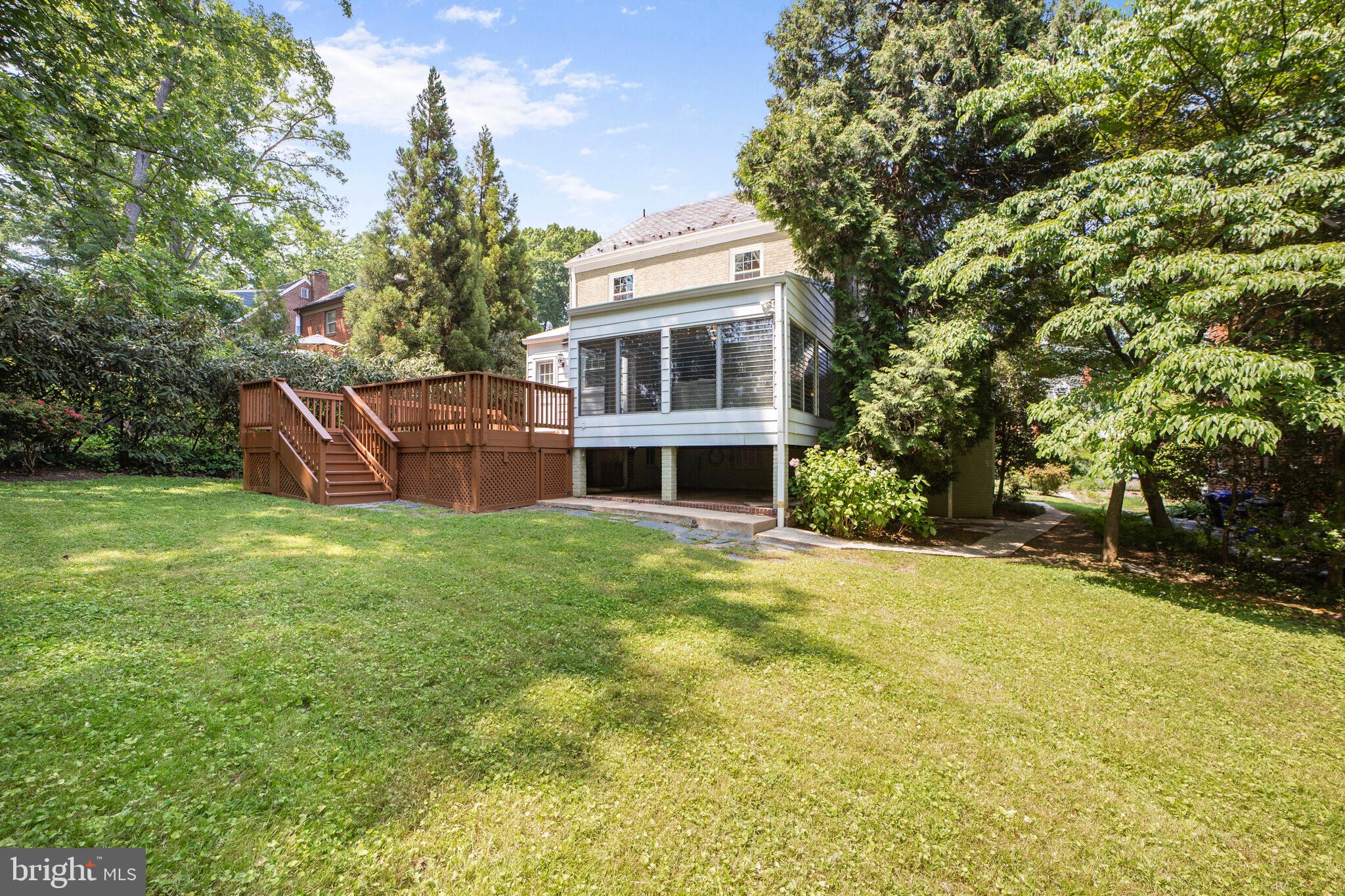 1512 Live Oak Drive Silver Spring, MD 20910 - Photo 30 of 34 a front view of a house with a garden