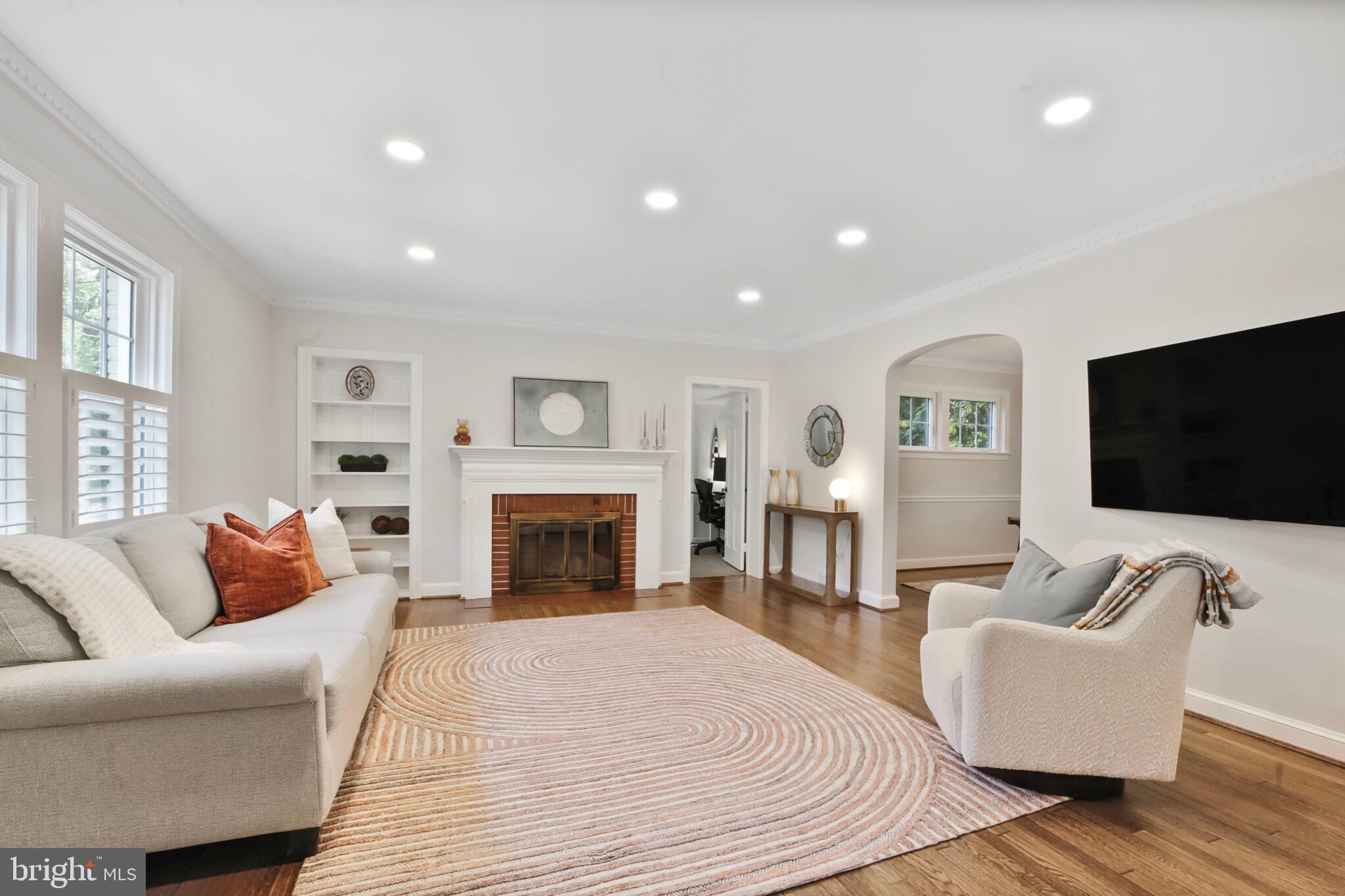 1512 Live Oak Drive Silver Spring, MD 20910 - Photo 6 of 34 a living room with furniture fireplace and flat screen tv