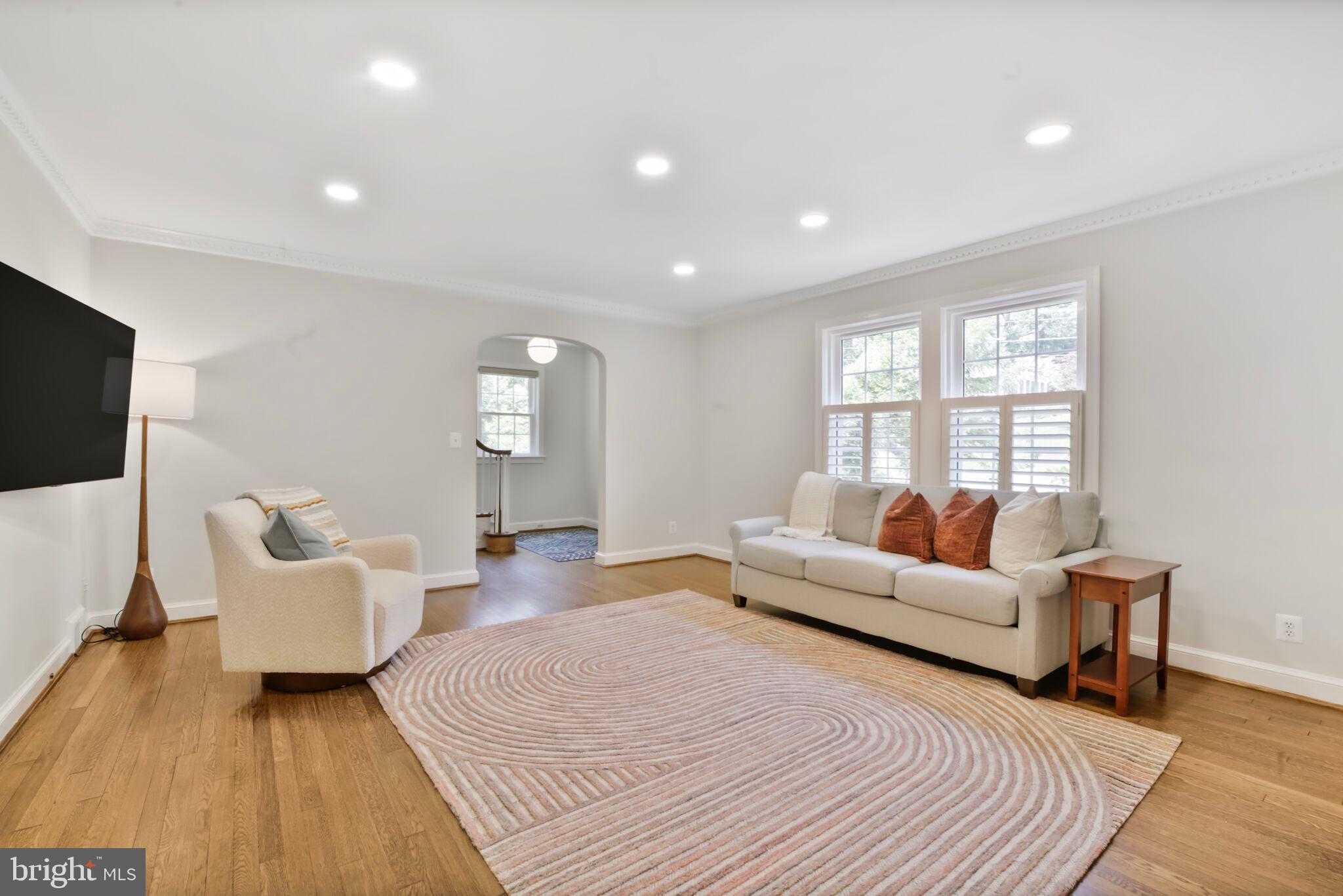 1512 Live Oak Drive Silver Spring, MD 20910 - Photo 7 of 34 a living room with furniture and a flat screen tv